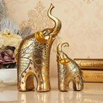 פסלים מיוחדים לבית זוג פילים מזהב